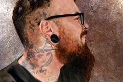 tattooed young man